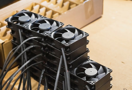 Small fans for cooling electronic devices