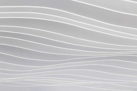 Gray wall decorated with cardboard waves. Backgroundの写真素材