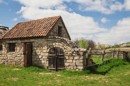 old abandoned shell house with roof tiles in Ukraineの写真素材