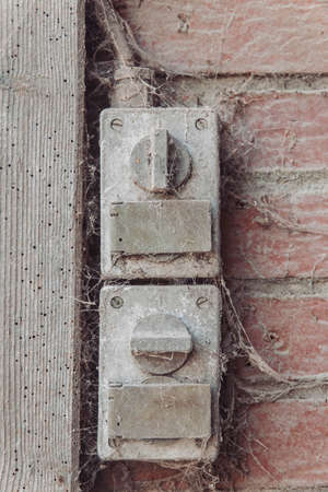 Old cobweb-covered switches in the factory