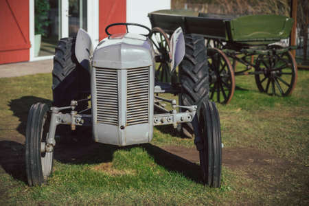 Vintage tractor and cart at the ranchの写真素材