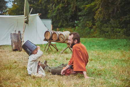 Hojbjerg, Denmark, August, 2022: The brewer plays with his son.のeditorial素材