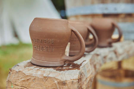 Vintage ceramic mugs at the viking festivalの写真素材