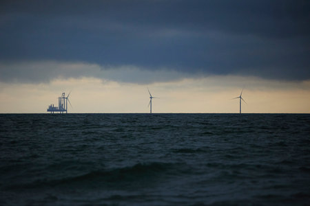 Station for installing a wind generator at sea. Evening in Denmarkの写真素材