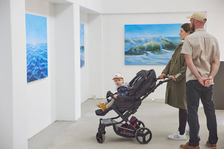 Skagen, Denmark, May 21,2023:Visitors look at the paintings in gallery