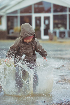 Charming child playing in Denmark