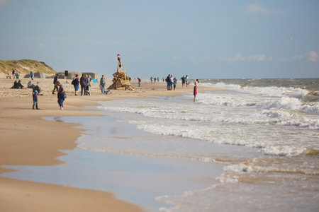Sondervig, Denmark, June 23, 2024: St. Hans Day on the seashoreのeditorial素材