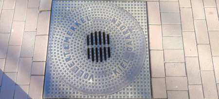 The manhole cover in the city. The manhole cover.の写真素材