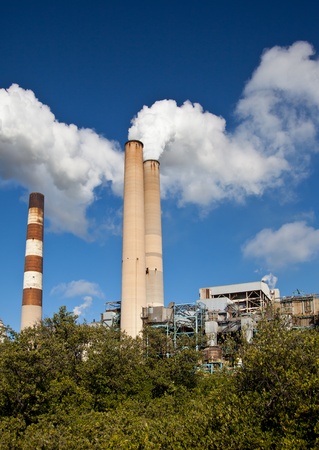Industrial power plant with smokestackのeditorial素材