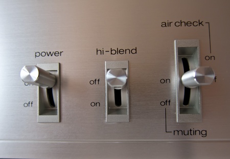 Analog electrical switch tumbler control closeupの写真素材
