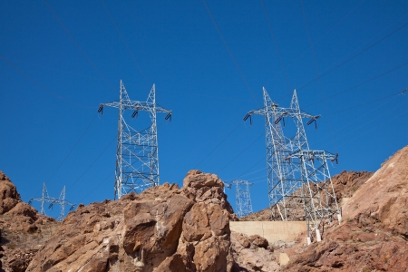 Heavy duty electric power poles blue skyの写真素材