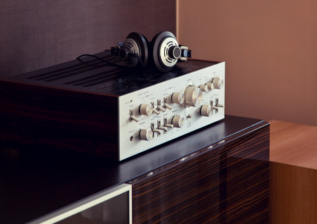 Vintage Audio Stereo Amplifier with Headphones Side View