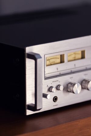 Vintage Stereo Receiver Front Panel with Controls Side View Closeupの写真素材