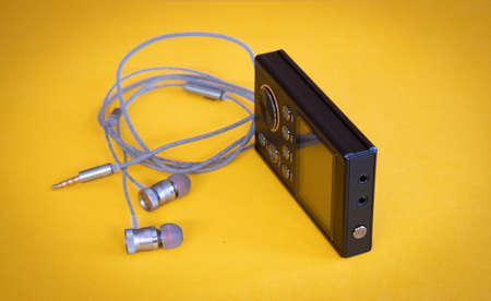 Personal Portable Music Media Player Gadget with Headphonesの写真素材