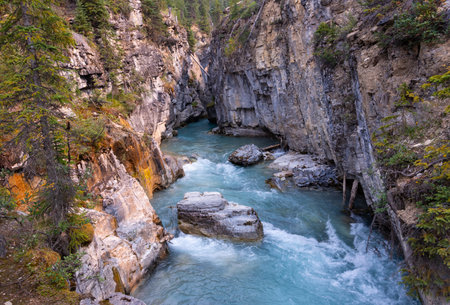 Stormy Mountain River flows in the middle of the Marble Canyon gorge, Kootenay National Park, Vermilion River, British Columbia, Canada, Beautiful Scenic Viewの写真素材