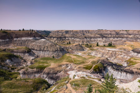 Badlands near Drumheller, Dinosaur capital of the world. One of Canada's most unique landscapes: land of hoodoos, multi-hued canyons and land formations sculptured by water and windの写真素材