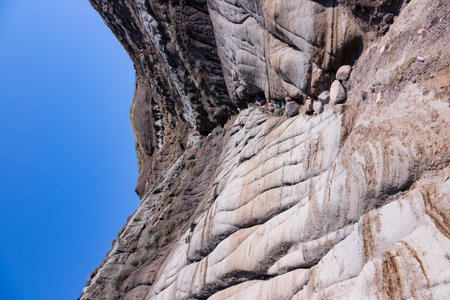 Surreal Badlands Sandstone Formations near Drumheller, Dinosaur capital of the world. Land of hoodoos, multi-hued canyons and geological erosion sculptured by water and windの写真素材