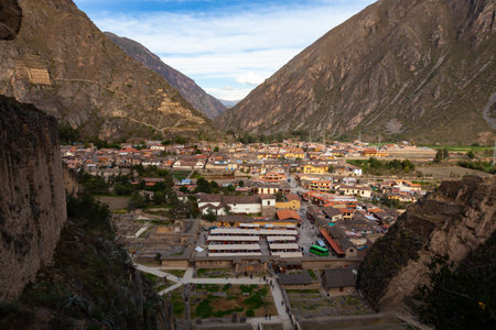 Ollantaytambo Village Modern Buildings Residential Area as seen from the Fortress Wall amid Andes...