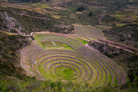 Old Inca Agriculture Heritage Site with Circular Terraces Located in Andes Mountains Sacred Valley, Moray, Cusco Region, Peru, South Americaの写真素材