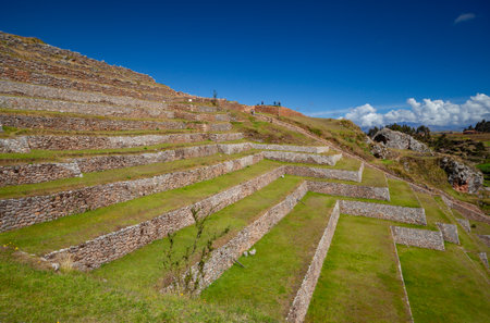 Old Inca Archaeological Heritage Complex Site with Angled Terraces Located in Andes Mountains Sacred Valley, Chinchero, Cusco Region, Peru, South Americaの写真素材