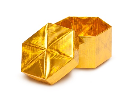 Open gold gift box isolated on a white backgroundの写真素材