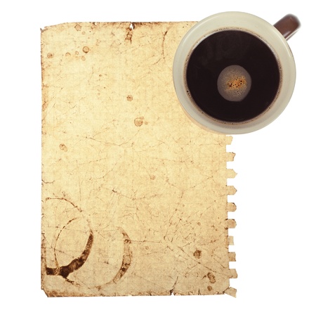 Old note paper with coffee cup on the white backgroundの写真素材