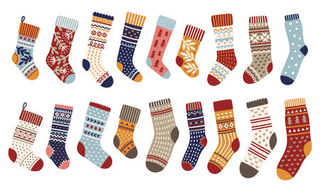 Christmas knitted socks set. Collection of cozy woolen winter accessories. vector illustrationのイラスト素材