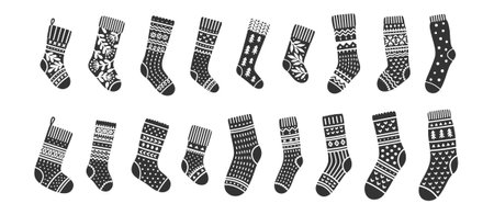 Vector socks icons set. Illustration of cute knitted accessories, black silhouettes with white Christmas ornaments. Clothes for men, women, and babies.のイラスト素材