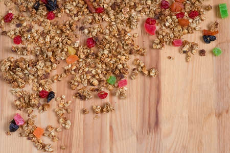 granola - sweet oat flakes with dried fruits. food background. top view. copy space. healthy food, healthy lifestyle.の写真素材