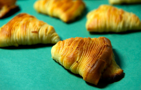 close-up of Neapolitan sfogliatelle, traditional italian puff pastry desserts stuffed with ricotta...