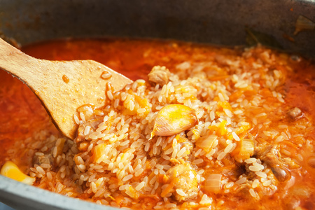 Traditional dish Uzbek pilaf with meat cookingの写真素材