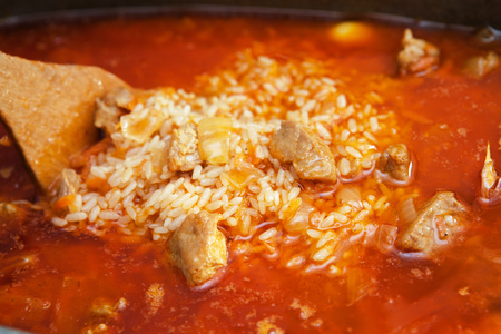 Traditional dish Uzbek pilaf with meat cookingの写真素材