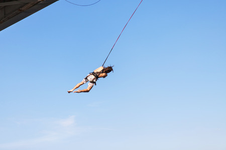 Rope Jumping: people in flight from a height. Jump from height.の写真素材