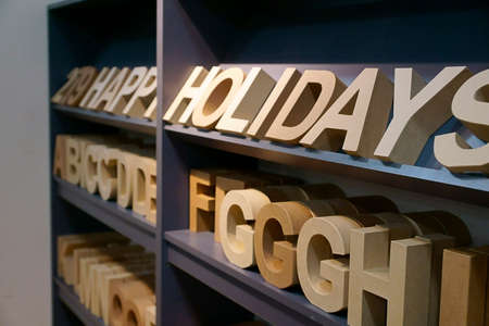 Wooden letters on the shelf in the storeの写真素材