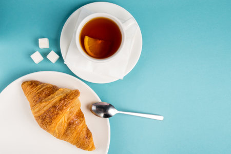 Top view of tasty breakfast with cereal flakes and croissants with coffeeの写真素材