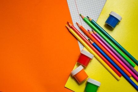 Back to school. Items for the school on a orange table.の写真素材