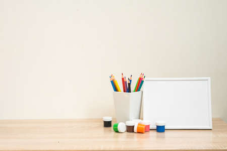 Student school frame mock up with colorful office supplies Back to school