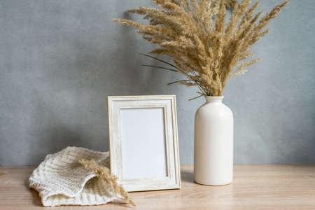 Portrait frame mock up with dried flowersの写真素材