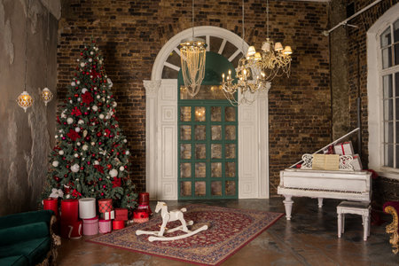 the piano in the room. interior with christmas tree and pianoの写真素材