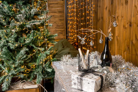 Christmas living room interior designtree decorated lights garland lighting holiday., dinner set table glasses decorの写真素材