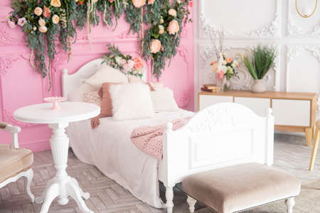 Childs room interior with comfortable bed and garlandの写真素材