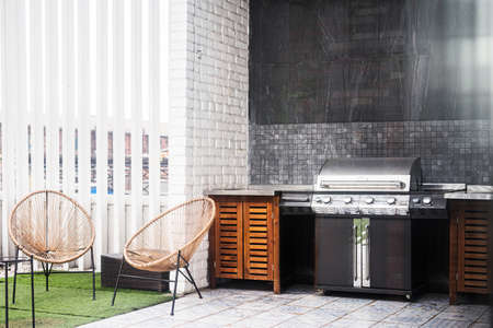 Barbecue open fireplace for cookout food. Outdoor BBQ Grill. Open Summer Kitchen.の写真素材