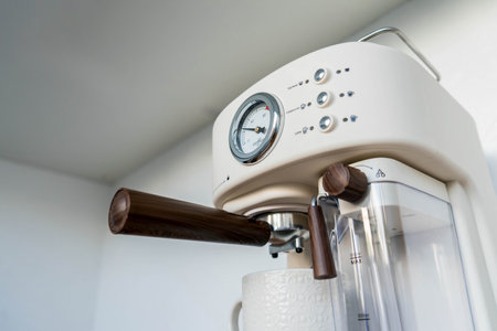 coffee equipment: detail of a white automatic coffee machineの写真素材