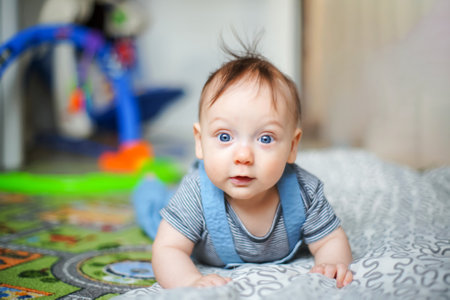 Cute little baby girl looking into the camera
