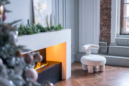 Modern fireplace sitting area with two leather chairs. Interior design.の写真素材