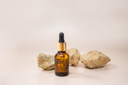 Bottles of dark amber glass with essential oil,の写真素材