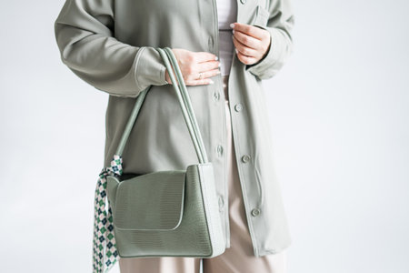 Woman holding shopping bags, text black friday, on gray backgroundの写真素材