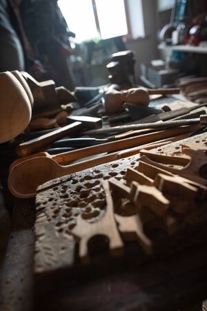 Workshop of professional Tar master artisan detailed work on wood violin in a workshop. Azerbaijan...