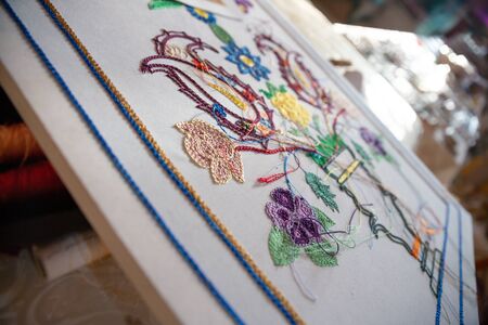 Photo of embroidered art on the canvasの写真素材