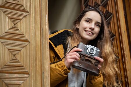 Photo of young tourist girl exploring streets of Baku. Moody photos of teenager girl visiting old...